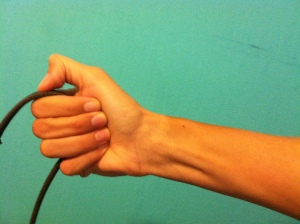 Reins should be held between the pinky and ring finger, and then be tamped down by the thumb.