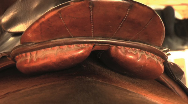 This saddle’s gullet channel is too narrow and the saddle has shifted to the left, as can be seen in the picture above at right. 